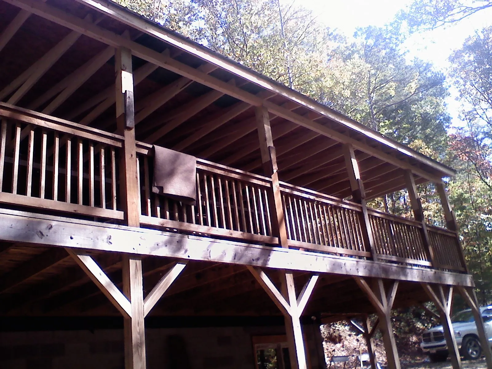 Timber framing under a new elevated porch and deck — Roof Leak Repair in Garner by Roofing Brothers